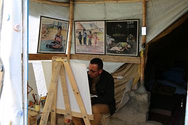 IOM Iraq, 2014. An artis. Domiz Syrian refugee camp in northern Irak.